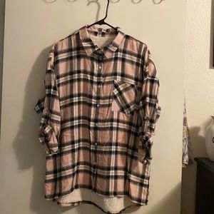 Long sleeve pink & black plaid buttoned down shirt w/Sherpa on the inside shirt.